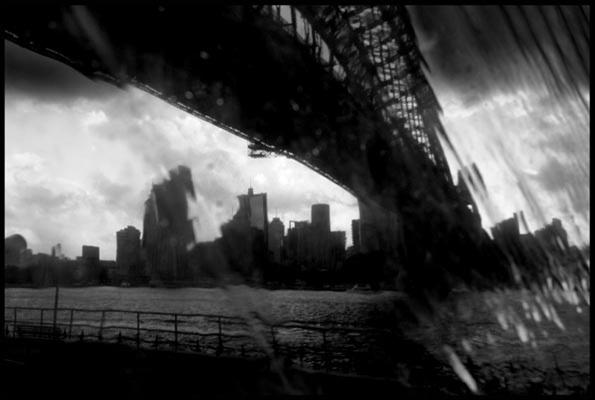 Sydney Harbour Bridge through a plastic awning