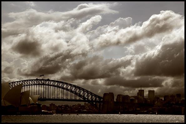 loudscape over the Harbour Bridge, the Opera House and Milsons Point
